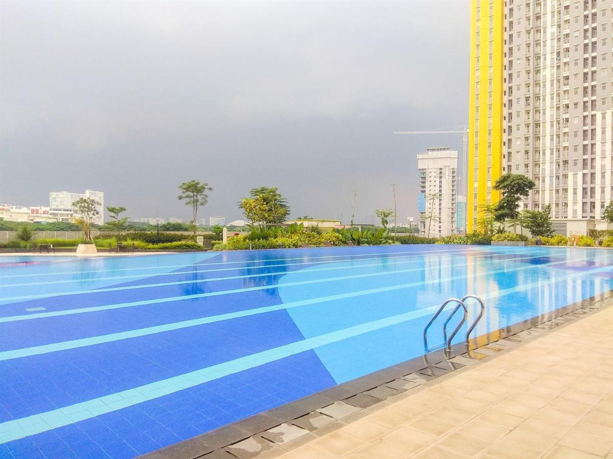 Modern White Studio At Springlake Summarecon Bekasi Apartment By Travelio Exterior foto